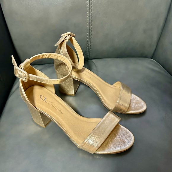 Gold sandals in size 7. Beautiful ankle strap & 2.5” block heel for comfort. - Picture 1 of 5